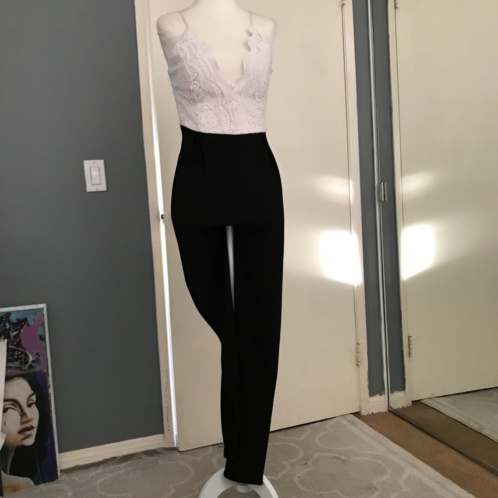 White lace v neck and black pant jumpsuit